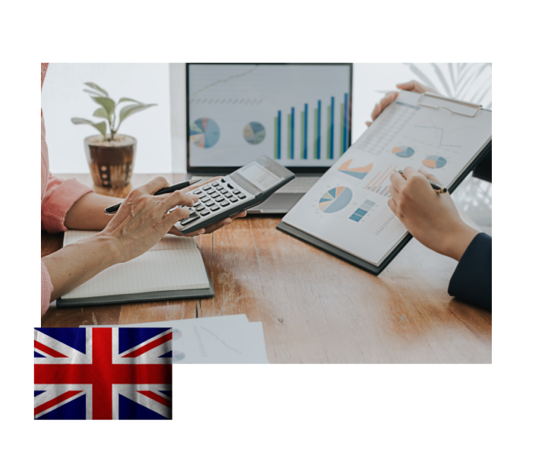 Startup founders reviewing growth charts on a tablet — Innovator Founder visa UK